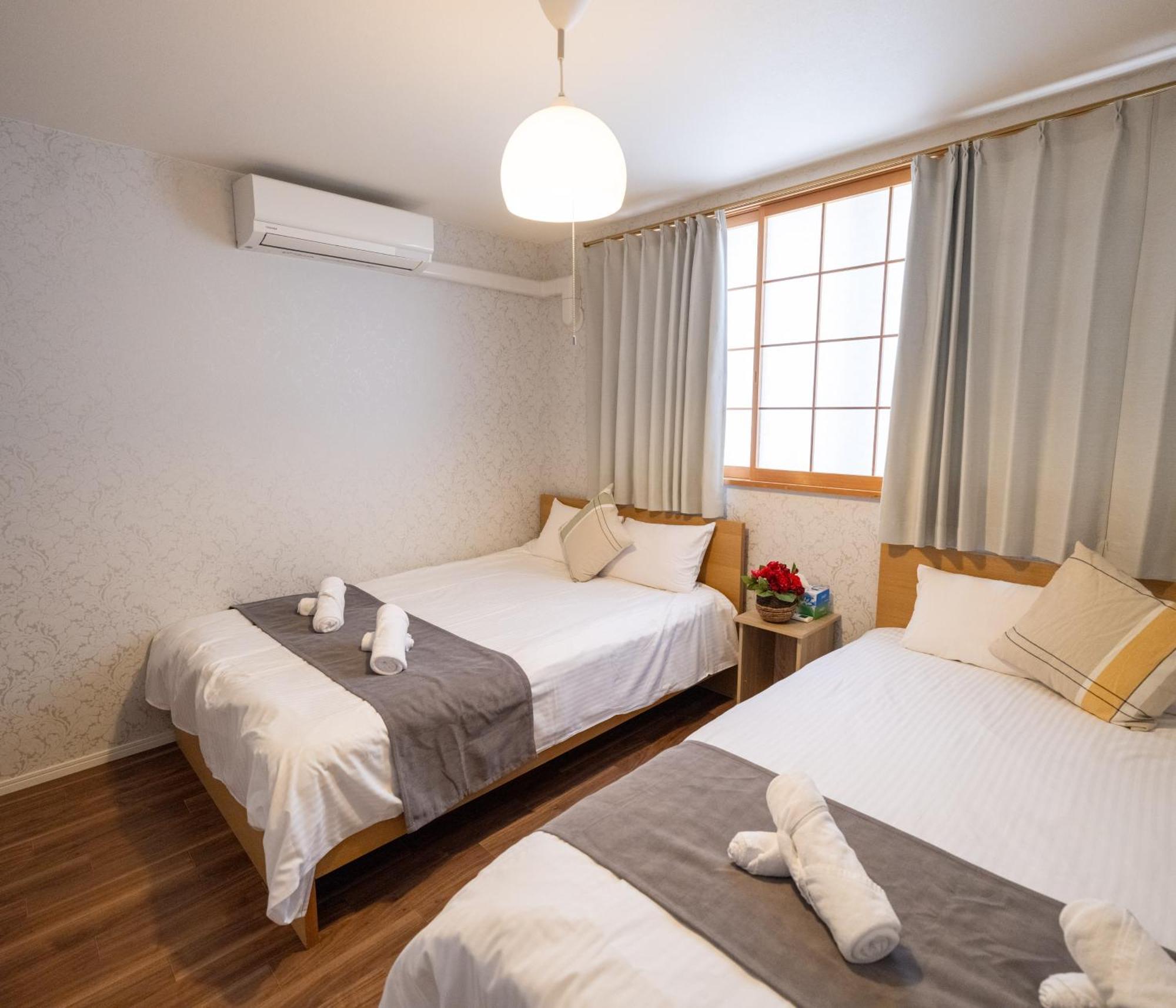 Ferienwohnung Oasis Naniwa Ōsaka Zimmer foto